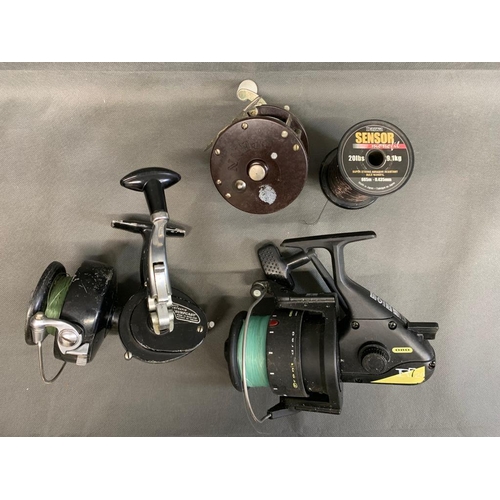 74 - 2 fixed spool fishing reels, 1 is an Intrepid Surfcast, and 1 other beach reel, plus a Penn No. 85 M... 