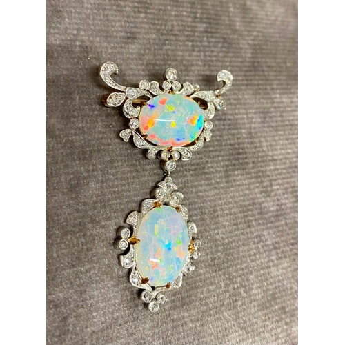 16 - A double opal brooch with diamond surround and set in 18 carat gold, possibly made in the 1920s. The... 