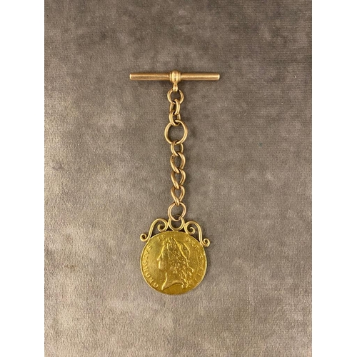 2 - A George ll Two Guinea coin dated 1738 on a 9 carat rose gold watch chain . The coin and mount weigh... 