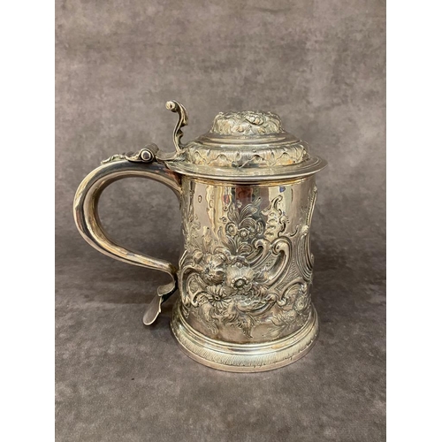 48 - A early solid silver tankard possibly 1719 with later embellishments