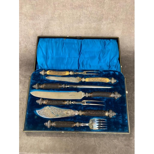 51 - An antique plated silver meat carving set with antler handles