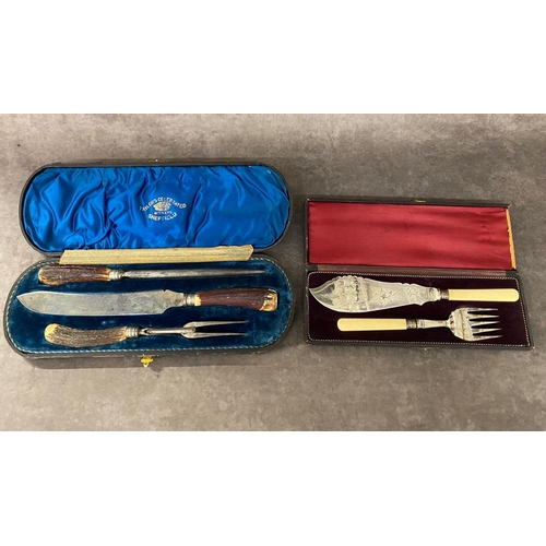 52 - An antique silver plated carving set along with fish knife £15-£20