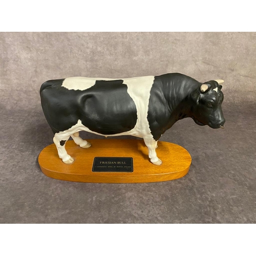 54 - A Beswick Bull on beech plinth