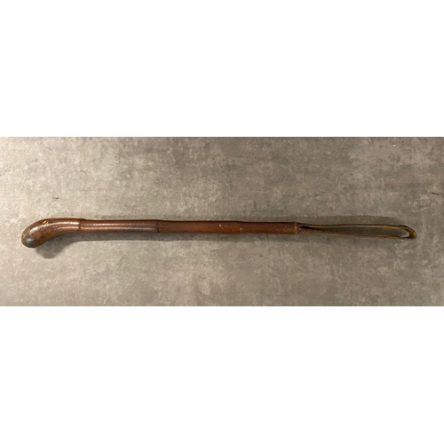 55 - A 19th century leather cosh 63cm long