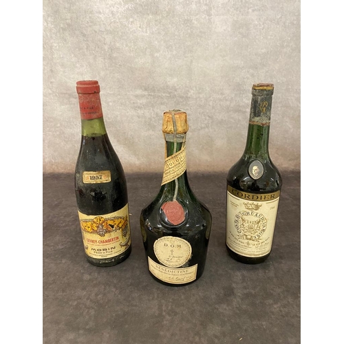 71 - 2 vintage bottles of wine along with a 1950s bottle of Benedictine. A 1957 Gevrey-Chambertin, a 195... 