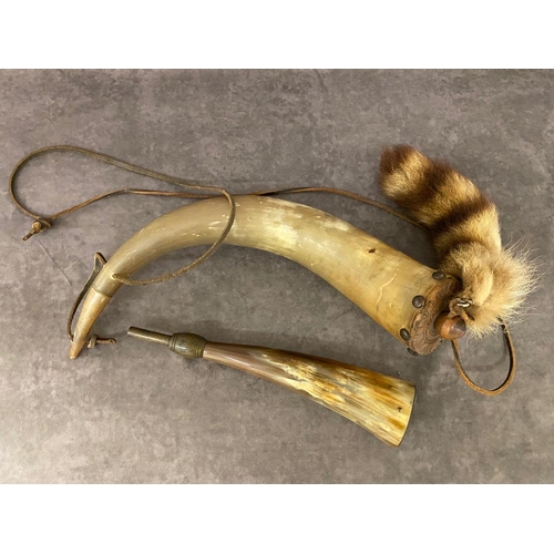 73 - A pair of vintage powder horns