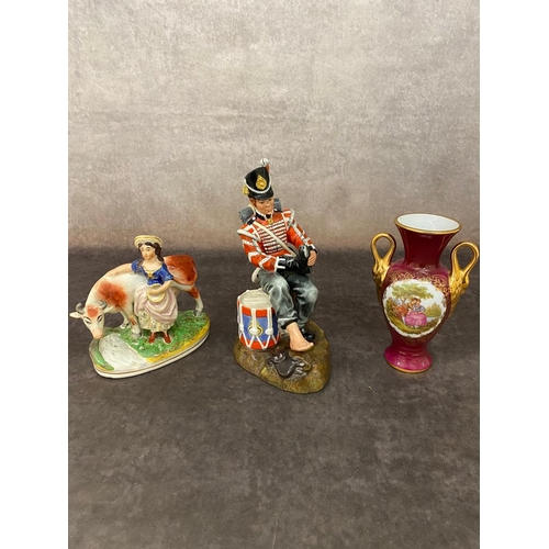 75 - A royal Doulton Drummer boy with two other items