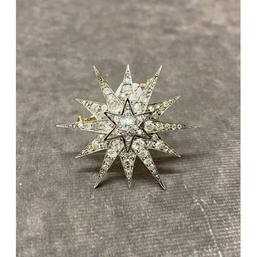 41 - Brooch  / pendant

A Diamond Star Brooch  / Pendant mounted in white metal (Which reacted similar to... 