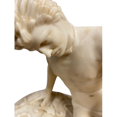 53 - After the Antique, a late 19th Century carved alabaster figure ''The Dying Gaul'': Lying on his shie... 