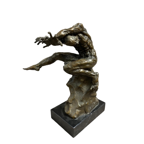 54 - A wonderful bronze figure of a screaming man on marble base 32cm high, with illegible signature