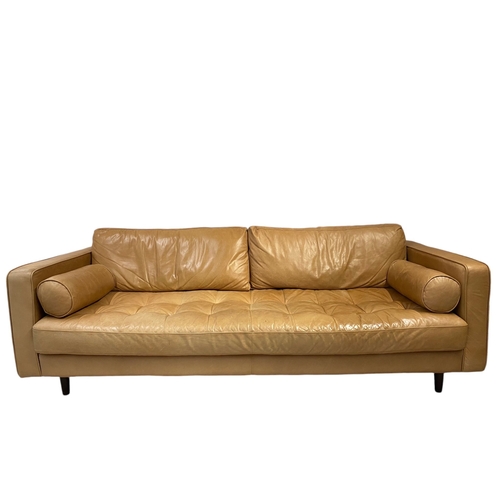 99 - A stylish modern leather settee 
  
 Width 2223 cm