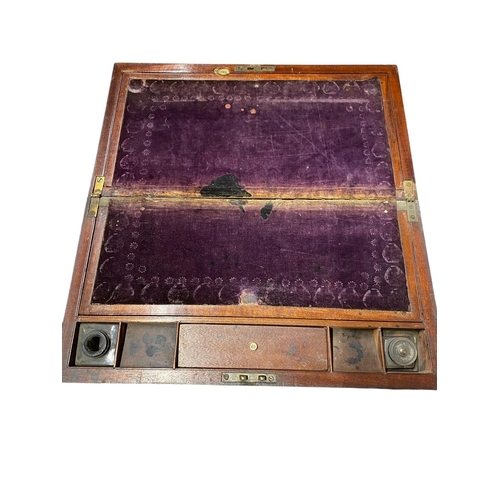 10 - An antique writing box with a rather interesting secret compartment.