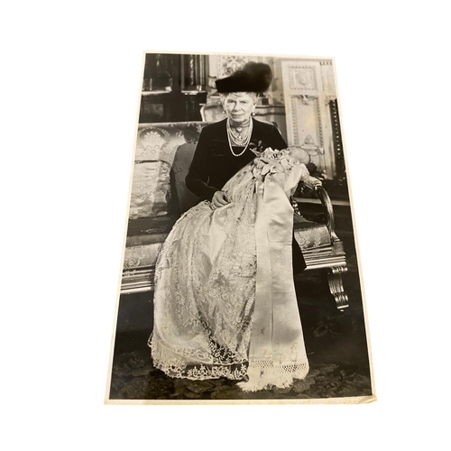 19 - A signed photograph of the late Queen Mary holding the infant King Charles lll at his Christening, a... 