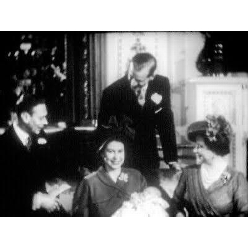 27 - A reel of film with footage showing the Christening of King Charles III in 1948. 
  
 The film shows... 