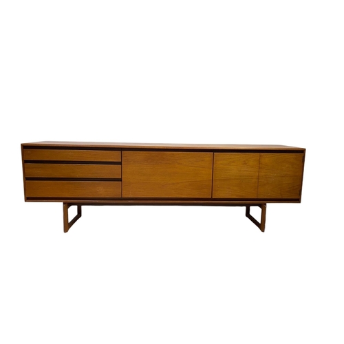 32 - A mid Century White and Newton Ltd teak sideboard. 
  
 Almost in mint condition with some very mino... 