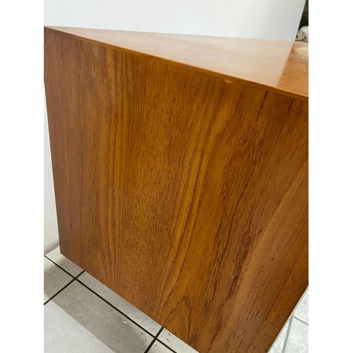 32 - A mid Century White and Newton Ltd teak sideboard. 
  
 Almost in mint condition with some very mino... 