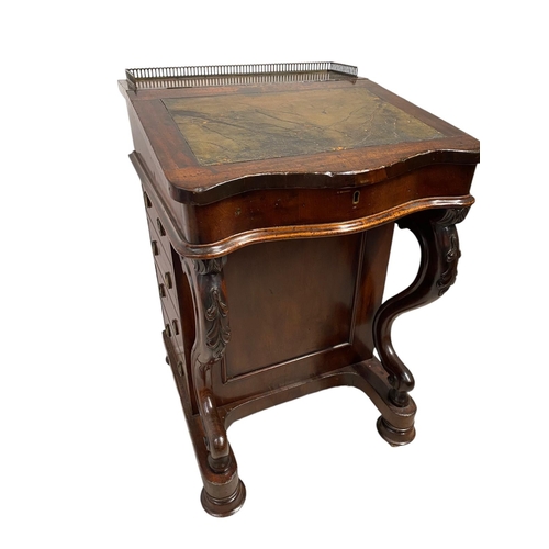 36 - A George III mahogany Davenport desk, with early castors, all original metalwork and original fret r... 