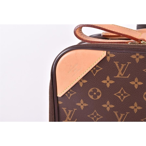 A Louis Vuitton monogrammed 55 Roll-on cabin suitcase with leather name tag  and hand strap, and gol