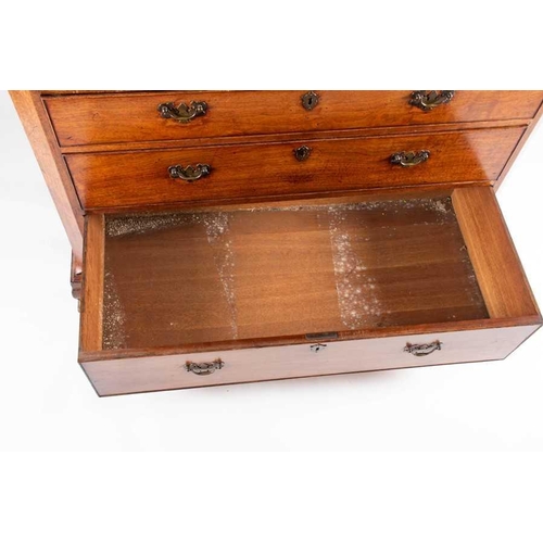 121 - A fine George III oak chest on chest with canted front corners two short over three graduated drawer... 