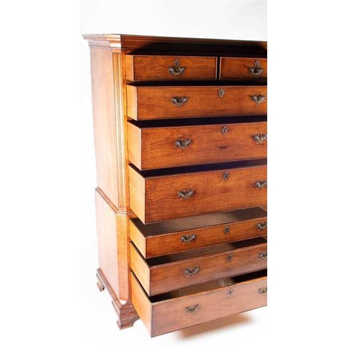 121 - A fine George III oak chest on chest with canted front corners two short over three graduated drawer... 