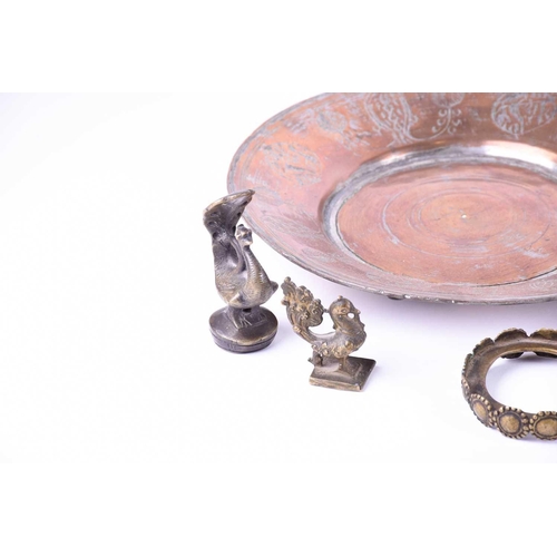 214 - A Tibetan cast bronze oil lamp, hentha weights, a leaf shape oil lamp, an Indian brass bowl, a Tibet... 