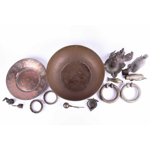 214 - A Tibetan cast bronze oil lamp, hentha weights, a leaf shape oil lamp, an Indian brass bowl, a Tibet... 