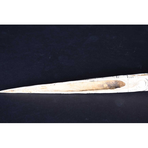 80 - A Cassowary bone dagger, East Sepik River Province, Papua New Guinea, with incised bands of stylised... 