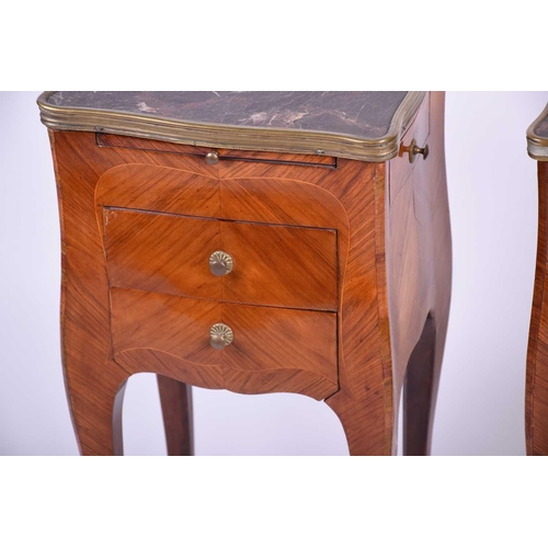 101 - A pair of French kingwood and marble topped bedside tables, early 20th century, with gilt metal fitt... 