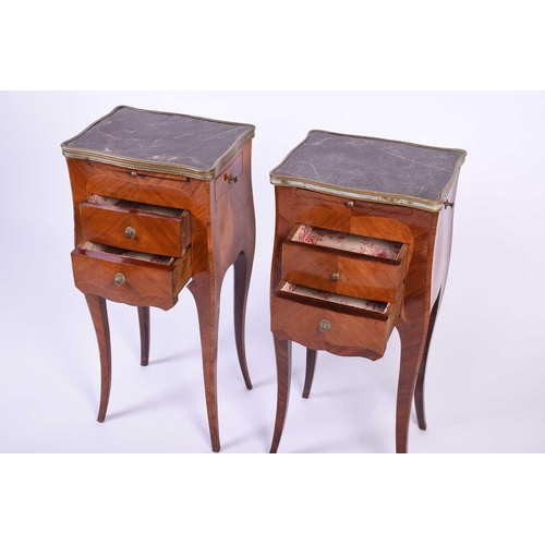 101 - A pair of French kingwood and marble topped bedside tables, early 20th century, with gilt metal fitt... 