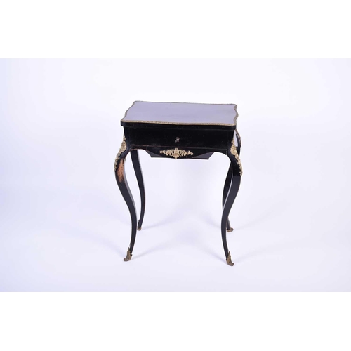 104 - French 19th century ebonised and ormolu mounted dressing table, the interior of the lid with mirror ... 