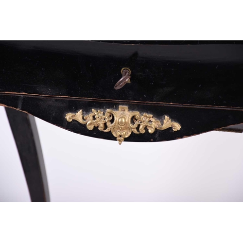 104 - French 19th century ebonised and ormolu mounted dressing table, the interior of the lid with mirror ... 