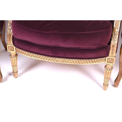 105 - A French carved, gilded and upholstered armchair, late 19th/early 20th century, together with two Fr... 