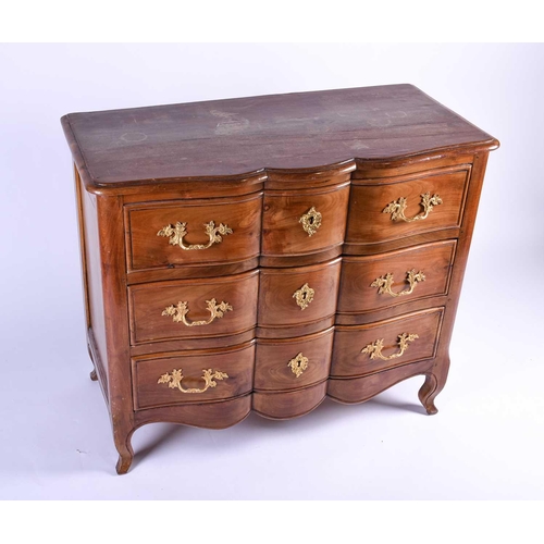 106 - A French walnut chest of three long drawers, 19th century, the shaped drawer fronts with drawers wit... 