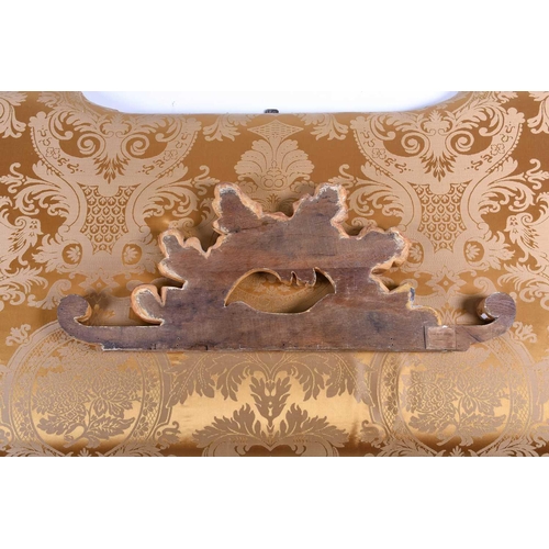 107 - A 20th century carved giltwood cushion-back headboard, with acanthus scroll surmount and corners, 21... 