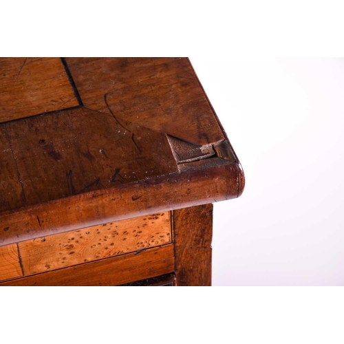 108 - A late Georgian mahogany chest of drawers, early 19th century, the top with ebony stringing, above t... 