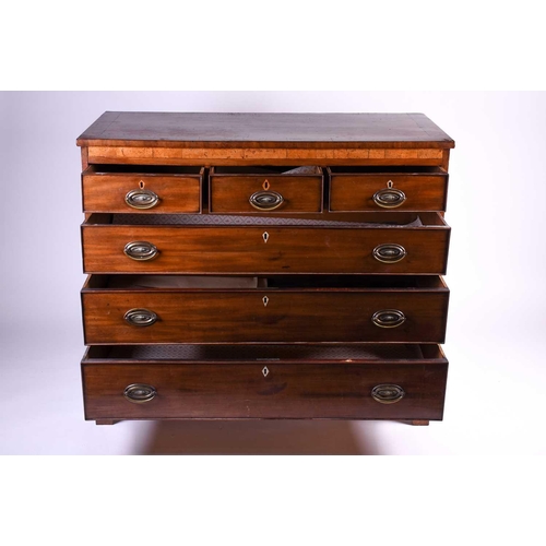 108 - A late Georgian mahogany chest of drawers, early 19th century, the top with ebony stringing, above t... 