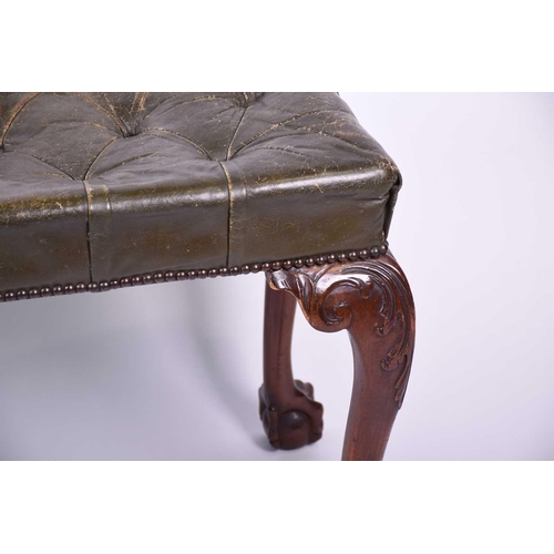 110 - A Geo III style mahogany duet stool, 20th century, with green leather buttoned seat, on four cabriol... 