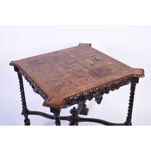 116 - An oak parquetry top table, 19th century, the square top with pronounced corners, the edge with appl... 