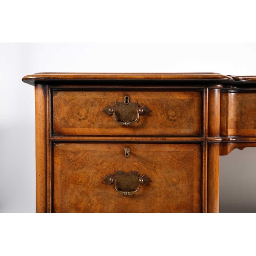 118 - A Titchmarsh & Goodwin Queen Anne style walnut writing desk, with tooled leather writing surface abo... 