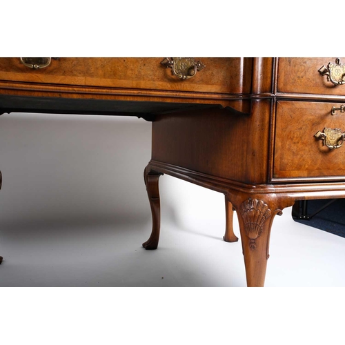 118 - A Titchmarsh & Goodwin Queen Anne style walnut writing desk, with tooled leather writing surface abo... 