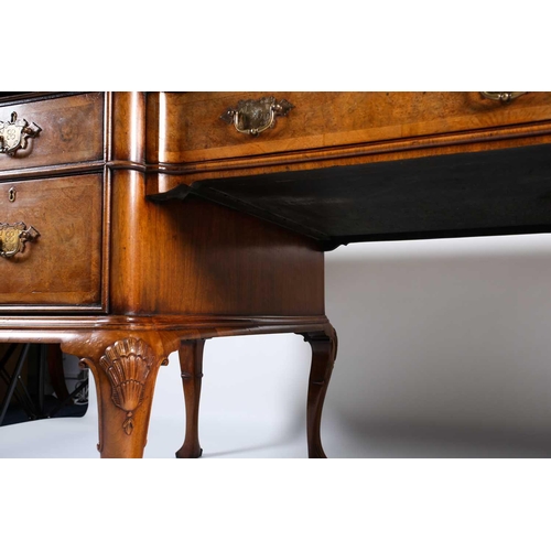 118 - A Titchmarsh & Goodwin Queen Anne style walnut writing desk, with tooled leather writing surface abo... 