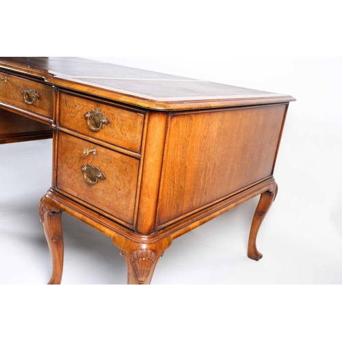 118 - A Titchmarsh & Goodwin Queen Anne style walnut writing desk, with tooled leather writing surface abo... 