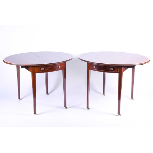 121 - A pair of reproduction mahogany Pembroke tables, the well figured tops with crossbanded and strung e... 