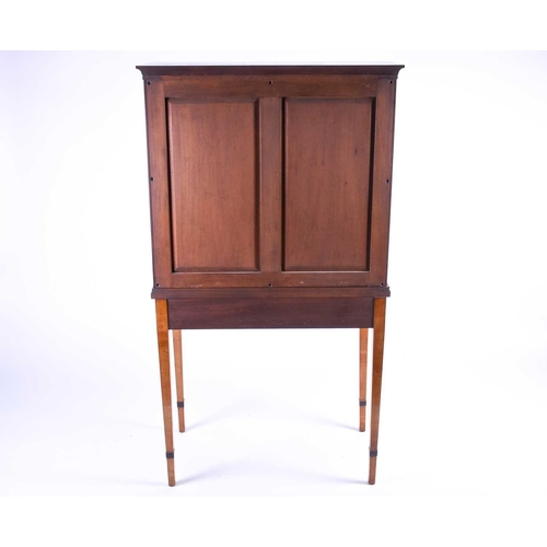 123 - A Georgian style satinwood display cabinet on stand, 20th century, the glazed doors with ebony strin... 