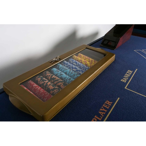 125 - An original Ritz (London) croupier’s baccarat card table, with gaming chips and related items, manua... 