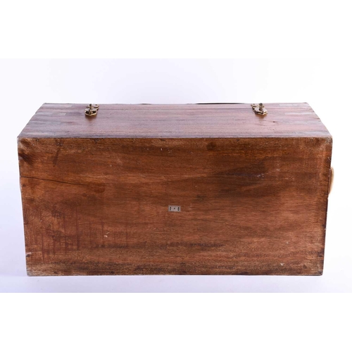 126 - A small campaign style reproduction teak chest, with brass bindings, locking clasps and carrying han... 