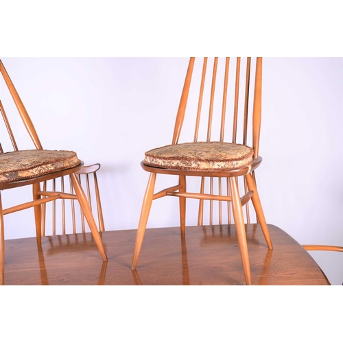 127 - Lucian Ercolani for Ercol, a mid-20th century beech dining room suite, comprising a refectory style ... 