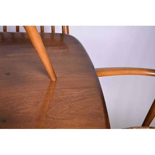 127 - Lucian Ercolani for Ercol, a mid-20th century beech dining room suite, comprising a refectory style ... 