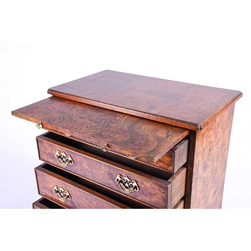 130 - A Georgian style small chest, oyster veneer, with slide over four graduated drawers on bracket feet,... 