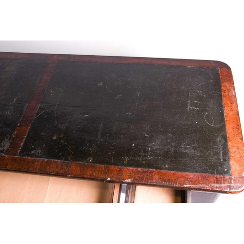 131 - A Victorian mahogany side table, the rectangular top with rounded corners and leather writing surfac... 